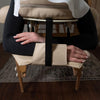 Massage table arm loop on the headrest
