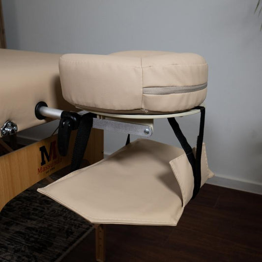 Massage table arm loop on the headrest